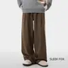 Pantalones Casuales Sueltos Negros Simples 2025 para Hombre, Nuevos Pantalones de Traje Caídos Anti-Arrugas Sin Planchar para Viajes de Negocio de Otoño