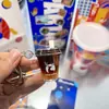 Luckin Coffee Mini Naranja C Americano Botella Arena Líquida Llavero Tendencia de Verano Colgante para Bolso de Pareja Regalo