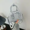 Bolsa de ombro estilosa estilo coreano para mulheres, nova moda primavera 2026, bolsa de ombro casual para trabalho e deslocamento, bolsa baguette para mulheres