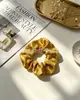 Versátil scrunchie de coleta estilo coreano con tela floral estilo ins, scrunchie para accesorios para el cabello, fábrica de origen