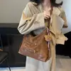 Bolsa de mão retrô estilo coreano, novo modelo 2026, mochila versátil de alta qualidade, bolsa de ombro e transversal casual e da moda