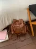 Bolsa de Ombro Dupla com Laço Feminina 2026 Nova Tendência Moda Primavera Mochila de Alta Qualidade para o Trabalho Mochila para Estudante Universitário