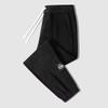 Pantalones deportivos de pana con forro polar de invierno para hombre, nuevos pantalones de chándal de moda negros que combinan con todo, de color sólido, con forro polar y cálidos.