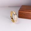 Moda japonesa y coreana chapado completo en oro rosa de 18 quilates acero de titanio fila única Anillo de diamante para hombre y mujer anillo de comida joyería no se decolora