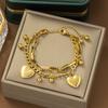 Pulsera nueva de doble capa con forma de corazón de amor de gran venta en Europa y Estados Unidos, de acero inoxidable, joyería de mano de moda versátil para combinar con todo