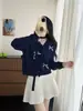 Nuevo cárdigan de punto a cuadros dulces con lazo para mujer, primavera y otoño, suéter corto calado con volantes