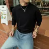 Suéter de punto negro de cuello alto medio estilo Old Money para hombre, versión coreana de invierno, top de capa interior cálido de alta gama