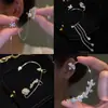 Estilo Douyin Mismo Estilo Mariposa Flor Colgante de Oreja Sin Agujeros en las Orejas Pinza para Oreja Mujer Lujo Ligero Elegante Versátil Espiga Borla Pendientes