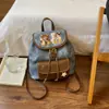 Mochila de Gama Alta para Mujer 2026 Nueva Tendencia Otoño Pequeña de Nicho Exquisita para Viajes Diarios Escuela Estudiante Universitario Mochila Exterior