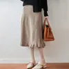 Falda de 100% lana pura con dobladillo con volantes para mujer, nuevo estilo otoño e invierno, cintura alta elástica, que cubre la cadera, tejida, de longitud media, plisada