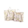 Bolsas de Sacola Plásticas Florais Suportam Impressão de Logo, Disponíveis em Múltiplas Cores para Lojas de Roupas, Adequadas para Embalagem de Presente para o Dia das Crianças