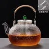 Espuma EPE embalaje transfronterizo hervidor con asa de cobre tetera doméstica de alto borosilicato asa para tetera infusor de té tetera de cerámica eléctrica