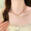 Collar artístico con colgante de piedra ojo de gato estilo retro francés para mujer, moderno, de lujo ligero, alta gama, versátil para otoño e invierno, cadena para suéter