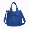 Nova bolsa tote portátil estilo ins japonês lona para carregar na mão bolsa para marmita feminina versátil bolsa de ombro