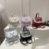 Mochila Nova Moda Primavera 2026 Mochila Casual Texturizada Personalidade Simples Bolinhas Femininas Bolsa de Viagem Fresca