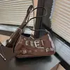 Bolso de axila de diseño de nicho estilo motocicleta vintage, nuevo bolso de hombro popular 2026, elegante bolso cruzado para el trabajo y los desplazamientos
