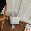 Bolsa de ombro tipo balde grande capacidade 2026 nova para mulheres, bolsa de mão versátil de nicho, bolsa de ombro e transversal