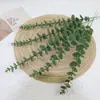 Hoja de eucalipto individual transfronteriza hoja de dinero decoración hoja de dinero decoración de boda planta verde simulación flor artificial eucalipto al por mayor
