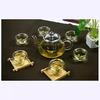 Juego de té de vidrio resistente al calor/tetera con filtro de flores y plantas/tetera para seis personas/juego de té Kung Fu con bandeja de té de bambú
