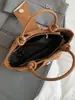 Bolso de hombro moderno y sencillo, nuevo bolso de mano para el verano de 2026, bolso tipo cubo informal de tendencia estilo coreano para mujer