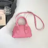 Bolsa Feminina Estilosa Texturizada de Ombro Cruzado Concha Moda Nova Primavera 2026 Casual Retrô Minimalista Tendência