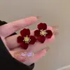 Pendientes festivos de terciopelo rojo con lazo para mujer, pendientes largos con borla floral dulces y elegantes para otoño e invierno