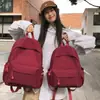 Mochila Casual Simple de Color Sólido Gran Capacidad Ligera Versátil Mochila de Viaje Hombres y Mujeres Exterior Estudiante Mochila Escolar Mujeres