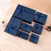 Caja de regalo azul con lazo estampado en caliente caja de regalo souvenir caja vacía caja de regalo navideño sensación de alta gama caja de regalo premium personalización
