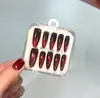 Nuevo producto transfronterizo: Puntas de Uñas Ojo de Gato Color Rojo Vino Cereza Rojo Profundo Bombilla, Caja de 10 Piezas con Tallas Codificadas, Puntas de Uñas Portátiles Ojo de Gato