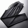 Calças de seda de gelo Verão Masculino Ultra-fino Malha de secagem rápida esportes Calças casuais Loose Extra grande tamanho Calças com ar condicionado