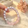 Pulsera de cristal rosa y perlas de color block, pulsera de cuentas degradadas de diseño nicho, estilo delicado, versátil para ir al trabajo, joyería femenina al por mayor