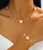 Moda Cruzada Europeia e Americana Estilo de Luxo Trevo de Quatro Folhas com Pedras Preciosas Rosa Trevo de Cinco Folhas Conjunto de Colar e Pulseira para Mulheres