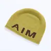 Gorro de Lana Mixta para Adultos, Estilo Igual para Pareja Aim Entity, con Protección para las Orejas, Casual Neutro con Bordes Ligeramente Enrollados
