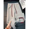Pantalones de chándal holgados, nueva colección de otoño, pantalones atléticos casuales negros, tejido gofrado estilo coreano, versátiles para el trabajo y el uso diario, pantalones largos a juego para pareja