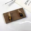 Brincos Pendentes em Formato de Gota com Zircônia e Pedra Olho de Tigre Estilo Levemente Luxuoso para Mulheres, Brincos Elegantes de Nicho de Alta Qualidade Estilo Retro Maillard