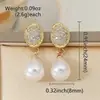 Aretes Lochen de zirconita micro-pavimentada con gota de agua y perla de imitación, un accesorio lujoso y elegante para atuendos formales y banquetes