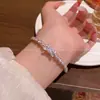 Pulseira de Laço com Strass Brilhante de Alta Qualidade para Mulheres, Temperamento de Luxo Leve, Anel de Mão Aberto Ajustável, Item Quente de 2026, Joia de Mão Exquisita