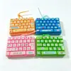 Brinquedo criativo e divertido para alívio do estresse: Chaveiro de teclado transparente de 26 teclas, pingente divertido para mochilas de estudantes