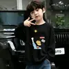 Camiseta de manga larga para niño, moderna y elegante, 100% algodón, primavera/otoño 2026, camiseta básica con estampado de dibujos animados estilo coreano para niños