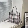 Bolso Pequeño Cuadrado Rayado a Cuadros de Color Contrastante Personalizado de Verano 2026 Nuevo Estilo Versátil para el Trabajo Cruzado al Hombro para Mujer