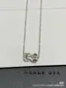 Nuevo collar de piedra roja herradura de Feijia, versión de alta gama para hombres y mujeres, collar y pulsera versátiles con cierre de ocho, V-oro baño de lujo ligero con 18k