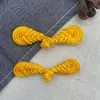 Suministro de origen al por mayor hebilla de plato de punto hebilla de pipa hecha a mano botón de cheongsam chino accesorios de ropa nacional de traje Tang