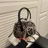 Bolsas de Alta Gama para Mujer 2026 Nuevo Estilo Bolso de Hombro para Viajar Bolso de Concha Moda Simple Diseño de Nicho Hombro Único Cruzado