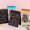 Venta al por mayor, libro creativo y colorido para rascar para niños, papel para rascar DIY, grafiti educativo, pintura para rascar, divertido libro para pintar con espiral.