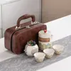 Conjunto de Chá de Viagem Estilo Antigo Conveniente Pequeno Conjunto Preparo de Chá ao Ar Livre Cerâmica Um Bule Três Xícaras Xícara Rápida Personalização de Logo Presente