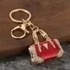 Llavero Creativo de Lujo con Bolsa de Goteo de Aceite y Pedrería, Colgante de Llave de Metal, Accesorio para Mochila, Llavero al por Mayor