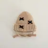 Gorro tejido para bebé con orejeras, nuevo estilo otoño/invierno, gorro de lana cálido con un lindo moño, a prueba de viento y adecuado para niños