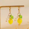 Pendientes y Collares de Flor de Limón Amarillo de Venta Caliente Transfronterizos para Mujer, Ganchos de Oreja Creativos Coloridos de Gama Alta, Pendientes de Fruta Fresca