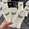 Calcetines Zhuji para Mujer Absorbentes de Sudor y Desodorantes Estilo Coreano Versátiles Tendencia ins Color Puro Letra Deportivos de Pareja Calcetines de Media Altura