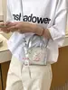 Bolso de mano para mujer con estampado de rombos 2026 nuevo de moda verano moda nicho para ir al trabajo al hombro bandolera cubo